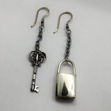 white brass earrings lock and key toxic love